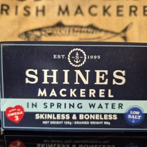 A 125g box of Mackerel Fillets in Spring Water - Low Salt, skinless and boneless, high in Omega 3. Features an illustration of a fish and “Irish Mackerel” in the background.